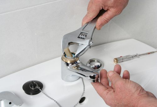 Plumber Faucet Repair Of A Sink