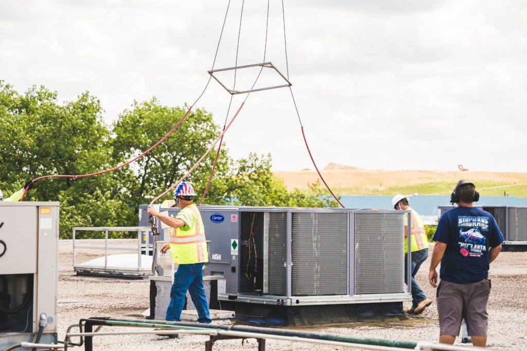 Hutchinson Utilizes Helicopter Lift for 17 HVAC Unit Install